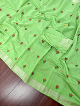 Green Cotton Tissue saree in cotton with floral embroidery with tissue borders — Kaash Collection