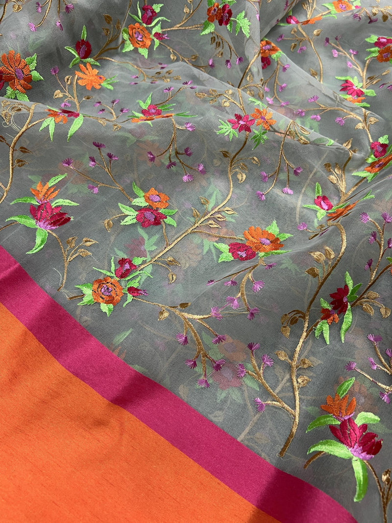 Handmade Grey Banarasi Organza Kora Silk Saree with Orange and Pink Raw Silk Patta on the Border - Floral Embroidery Saree - Kaash