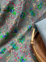 Grey Kora Banarasi saree in banarasi kora organza with floral embroidery with raw silk patta — Kaash Collection