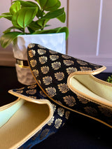 Black handmade men's jutti / mojari wedding shoes in soft banarasi silk with banarasi silk with gold buttis — Kaash Collection