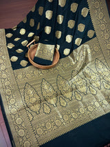 Black Color Traditional Banarasi Soft Silk Saree in Muted Yellow Gold Muted Zari Weave with Buttas and Floral Pattern