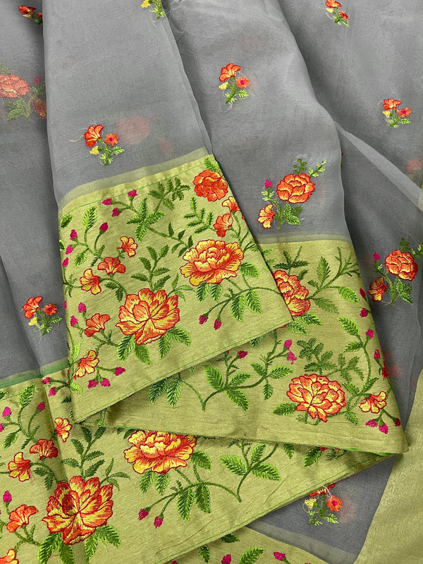 Handmade Light Grey Color Banarasi Kora Organza Saree with Floral Embroidery - Pista Green Raw Silk Border with Floral Embroidery