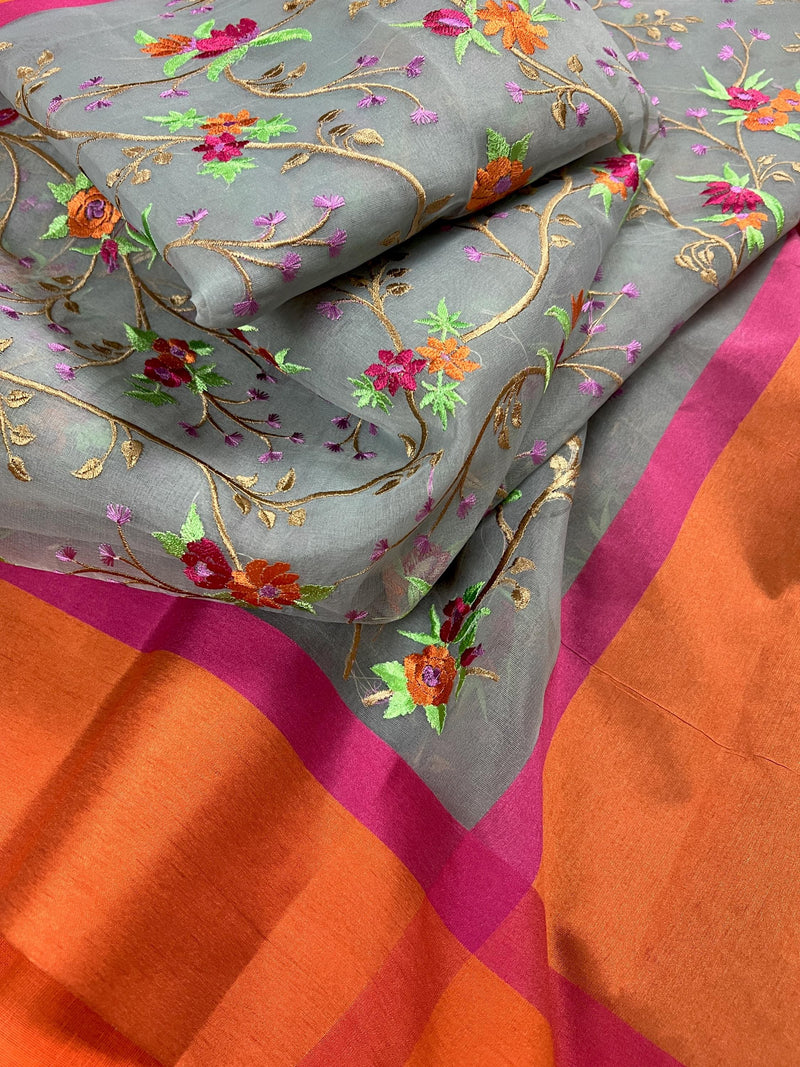 Handmade Grey Banarasi Organza Kora Silk Saree with Orange and Pink Raw Silk Patta on the Border - Floral Embroidery  Saree