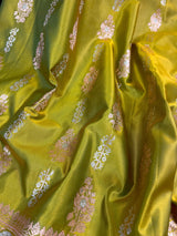 Dual Tone of Mehndi Green Banarasi Butter Soft Silk in Gold and Sliver Zari with Floral Design