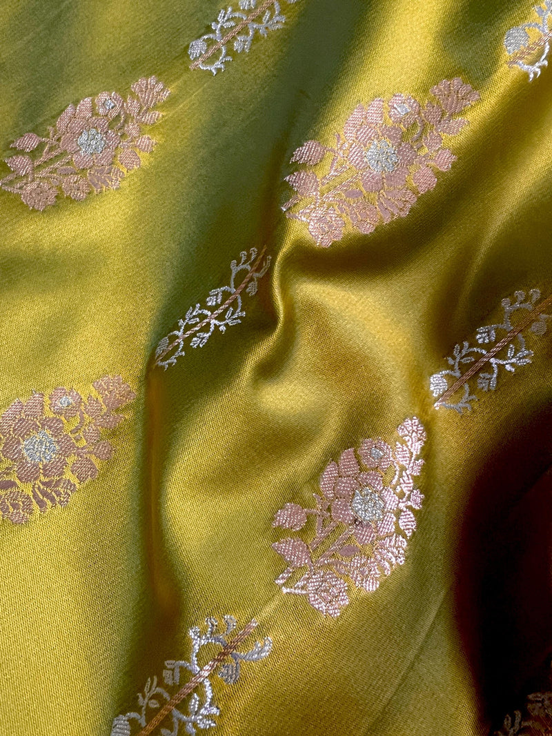 Dual Tone of Mehndi Green Banarasi Butter Soft Silk in Gold and Sliver Zari with Floral Design