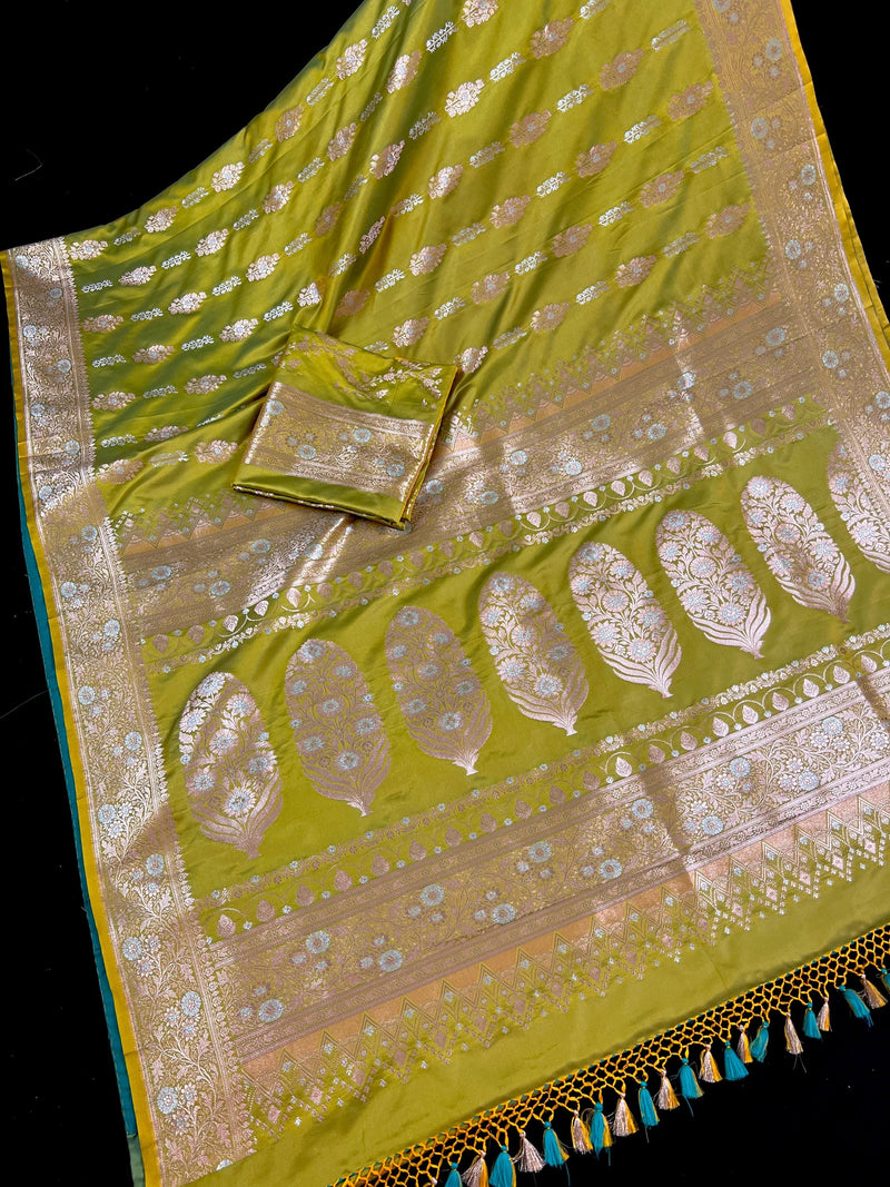 Dual Tone of Mehndi Green Banarasi Butter Soft Silk in Gold and Sliver Zari with Floral Design