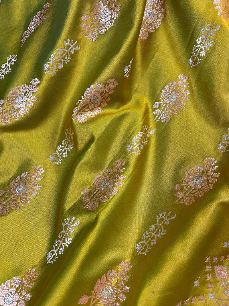 Dual Tone of Mehndi Green Banarasi Butter Soft Silk in Gold and Sliver Zari with Floral Design