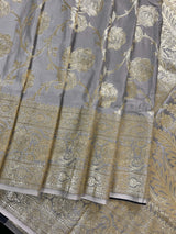 Pastel Gray Color Traditional Banarasi Satin Silk Saree with Muted Gold Zari Floral Jaal Weave