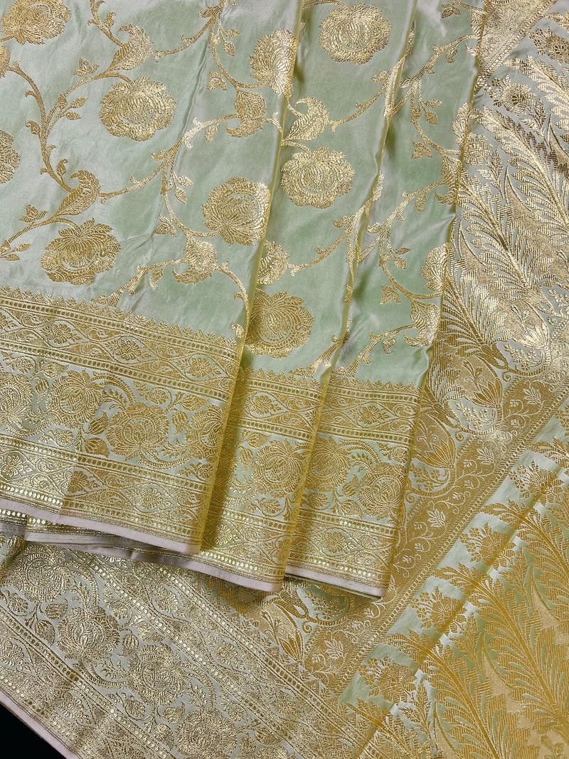 Pastel Sage Green Color Traditional Banarasi Satin Silk Saree with Muted Gold Zari Floral Jaal Weave