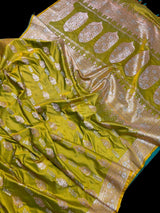 Dual Tone of Mehndi Green Banarasi Butter Soft Silk in Gold and Sliver Zari with Floral Design