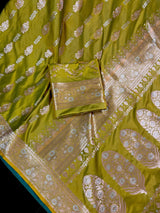 Dual Tone of Mehndi Green Banarasi Butter Soft Silk in Gold and Sliver Zari with Floral Design