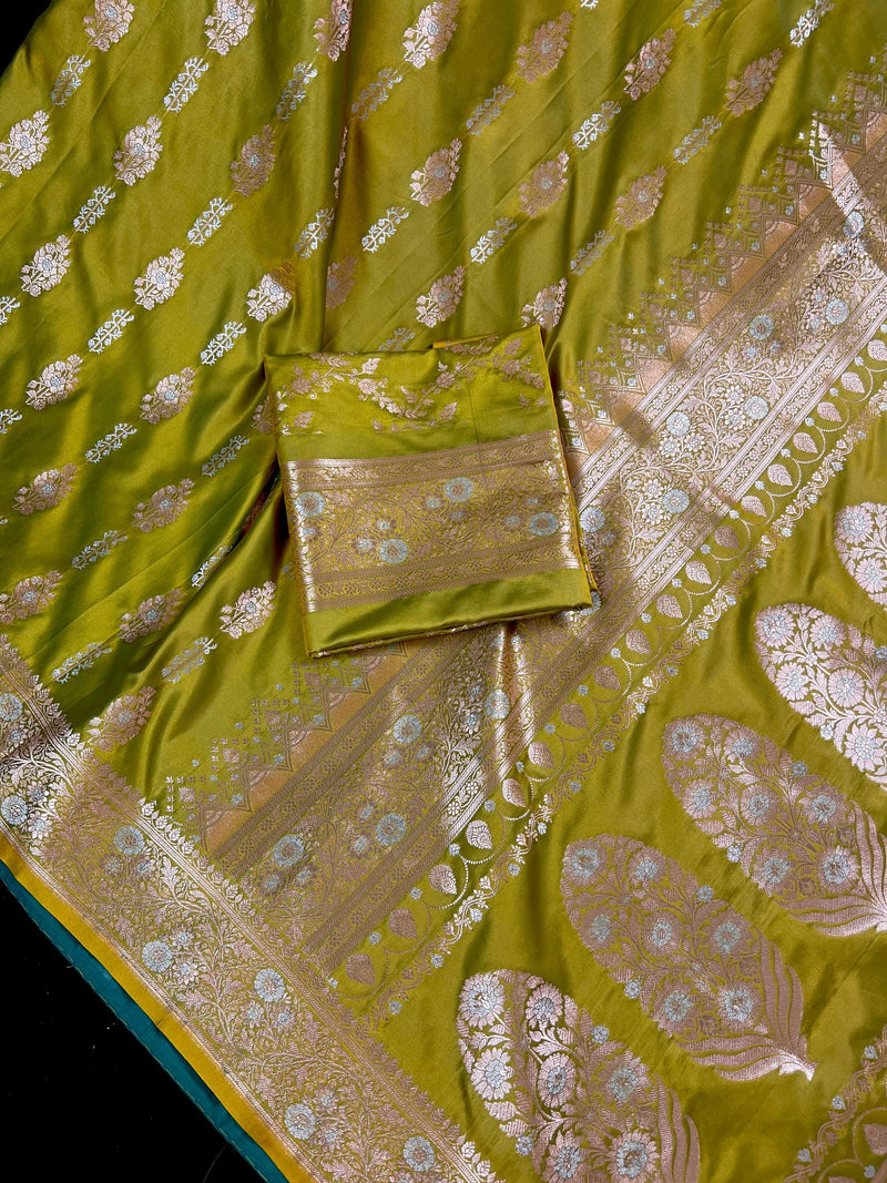 Dual Tone of Mehndi Green Banarasi Butter Soft Silk in Gold and Sliver Zari with Floral Design