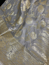 Pastel Gray Color Traditional Banarasi Satin Silk Saree with Muted Gold Zari Floral Jaal Weave