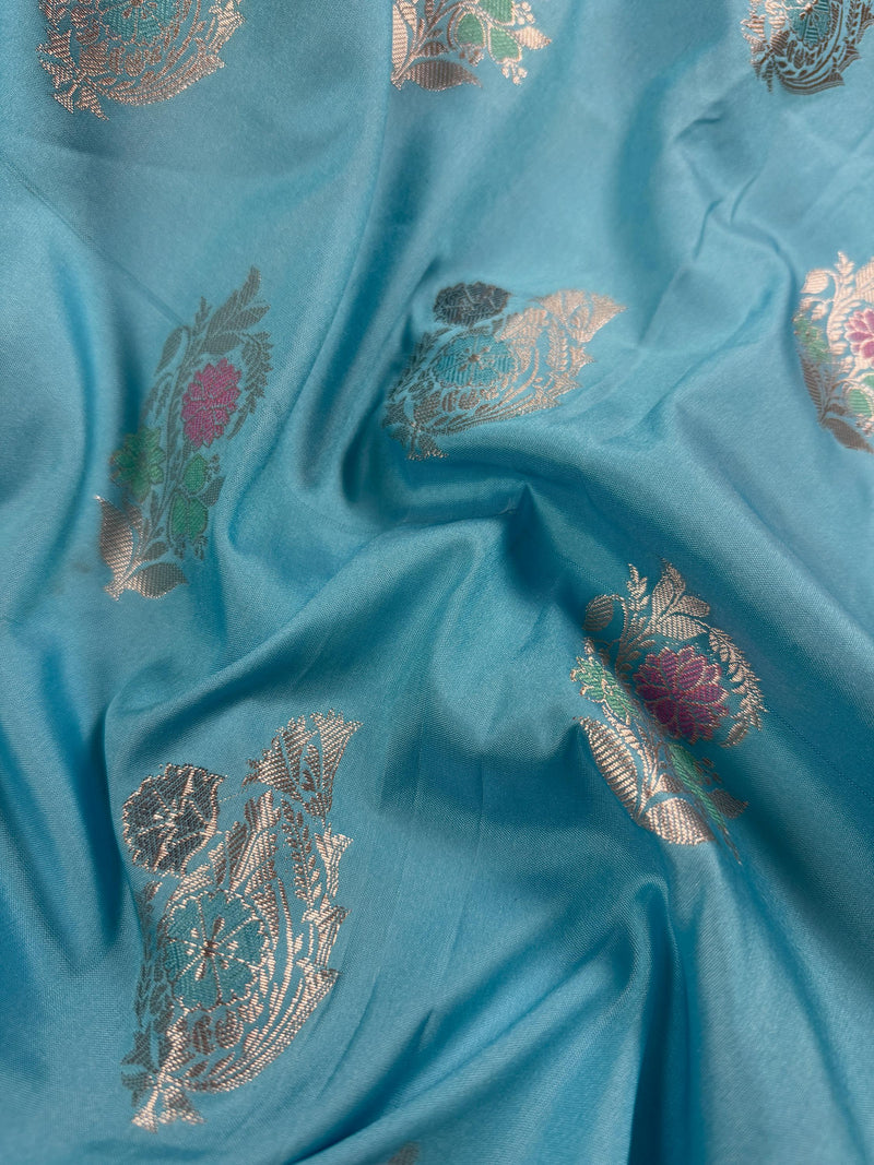 Statement Handmade Sky Blue Color Banarasi Semi Katan Silk Saree with Meenakari and Muted Gold Zari Weave with Floral Buttas