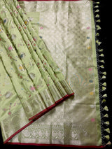 Statement Handmade Pastel Pista Green Banarasi Semi Katan Silk Saree with Meenakari and Muted Gold Zari Weave