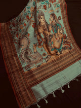 Deep Olive Green Color Semi Tussar Saree with Kalamkari and Radha Krishna with a Peacock Digital Prints - Kaash Collection