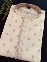 Light Cream Soft Raw Silk Men Kurta Pajama in Self Design material with Antique Zari Weave buti with Cotton Lining - Kaash
