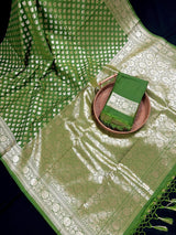 Mehendi Green (Heena Green) Banarasi saree in banarasi silk (non-pure) with small floral buttis in muted gold with grand pallu — Kaash Collection