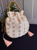 Pastel Peach Color Raw Silk Light Weight Potli Bag - Kaash
