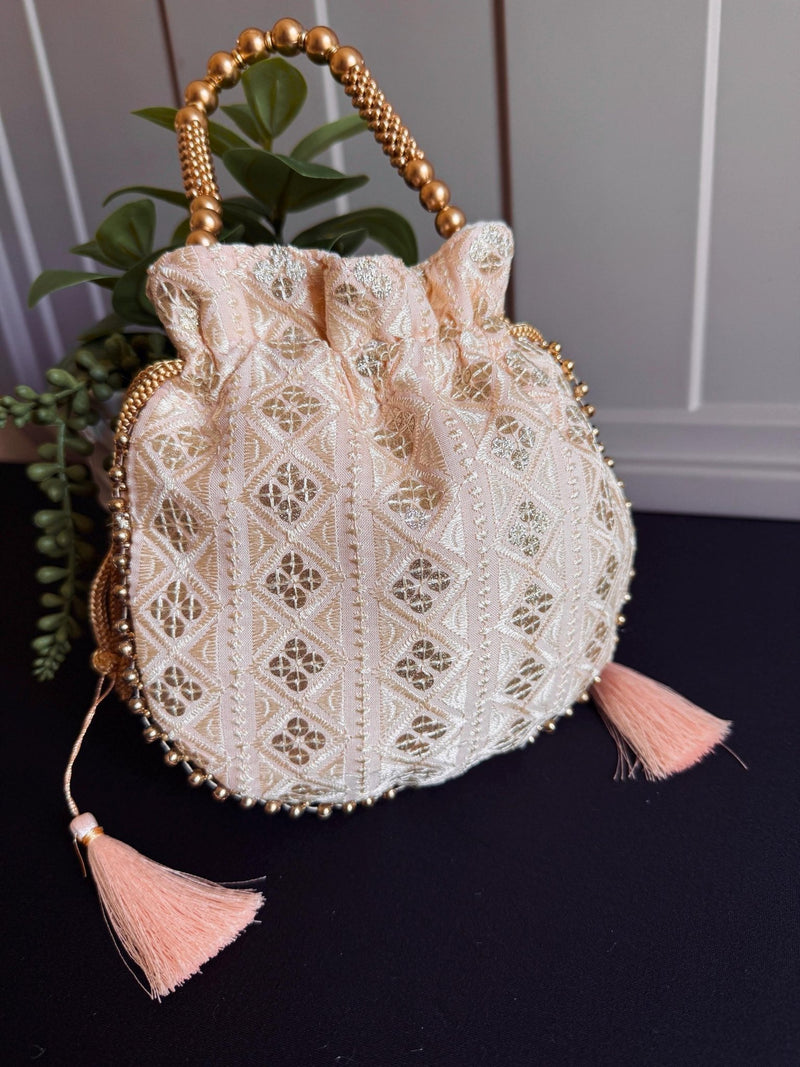 Pastel Peach Color Raw Silk Light Weight Potli Bag - Kaash