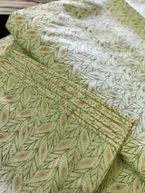 Pista Green men's kurta pajama in soft silk with gold & green patterns with handwork neckline — Kaash Collection