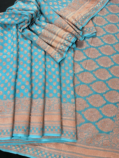 Pastel Blue pure khaddi georgette banarasi silk saree with copper zari with wide border — Kaash Collection