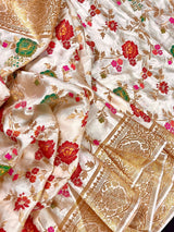 Creamy White with Tint of Gold Banarasi saree in pure banarasi satin with handwoven tanchoi with multi-color floral meenakari jaal — Kaash Collection