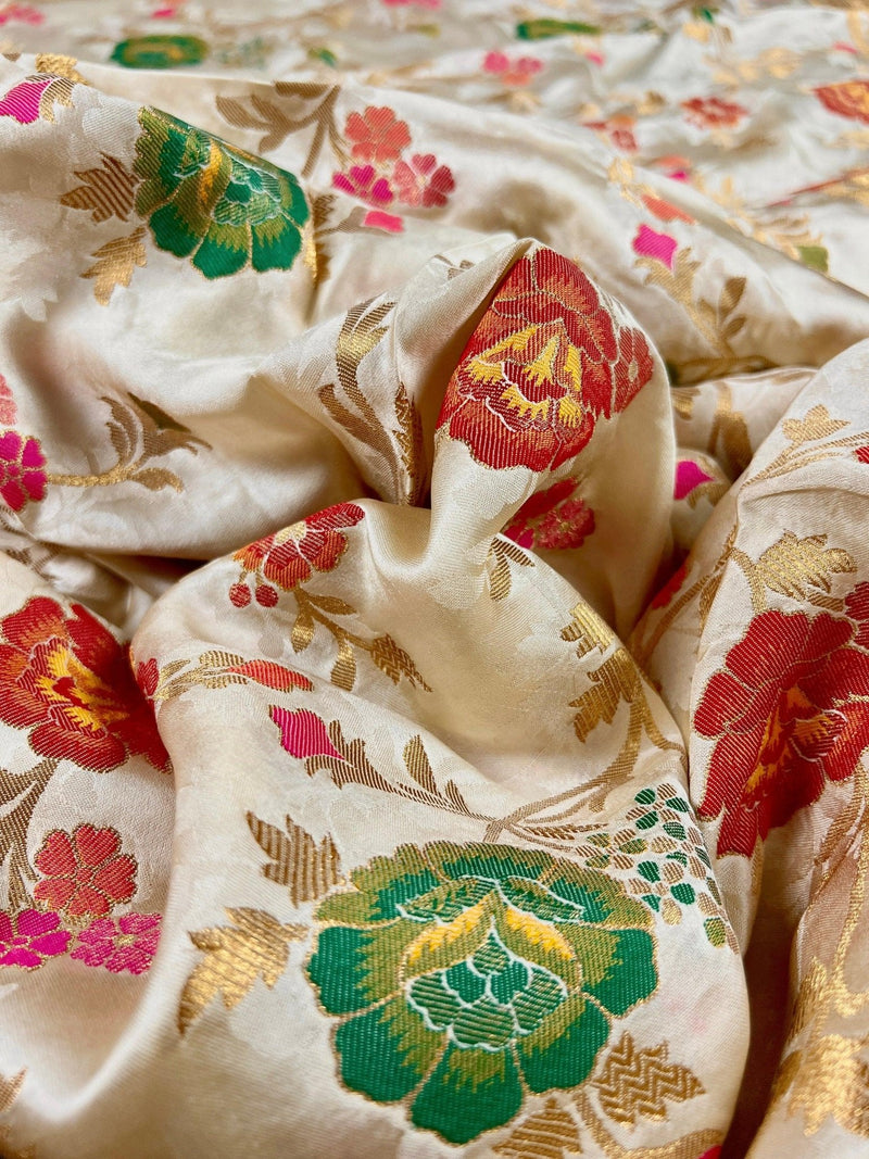 Creamy White with Tint of Gold Banarasi saree in pure banarasi satin with handwoven tanchoi with multi-color floral meenakari jaal — Kaash Collection