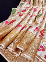 Creamy White with Tint of Gold Banarasi saree in pure banarasi satin with handwoven tanchoi with multi-color floral meenakari jaal — Kaash Collection
