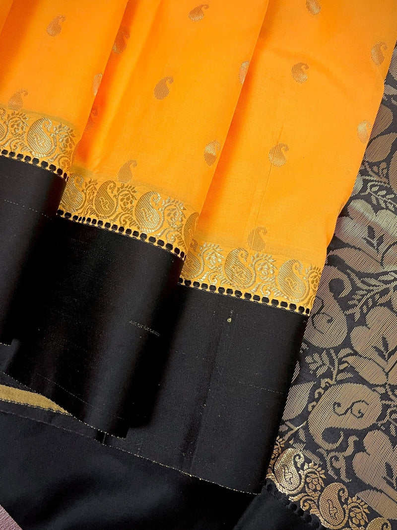 Yellow Banarasi Soft with Black Border saree in banarasi soft silk with buttis with plain black border & ambi pallu — Kaash Collection