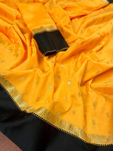 Yellow Banarasi Soft with Black Border saree in banarasi soft silk with buttis with plain black border & ambi pallu — Kaash Collection