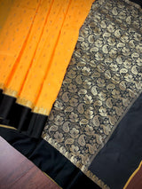 Yellow Banarasi Soft with Black Border saree in banarasi soft silk with buttis with plain black border & ambi pallu — Kaash Collection