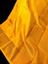 Yellow pure kanjivaram kanchipuram silk saree with muted copper zari weave — Kaash Collection