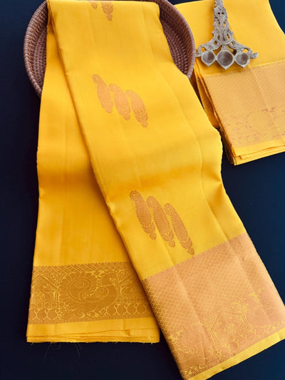 Yellow pure kanjivaram kanchipuram silk saree with muted copper zari weave — Kaash Collection