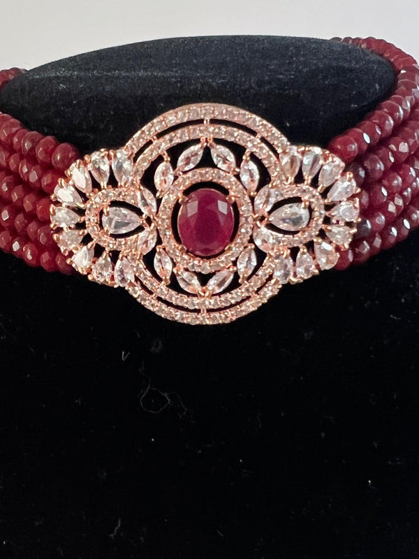 Bollywood Style Ruby Wine Color and Rose Gold Polish with CZ Necklace Earrings Choker Set in High Quality Beads and American Diamond - Kaash Collection
