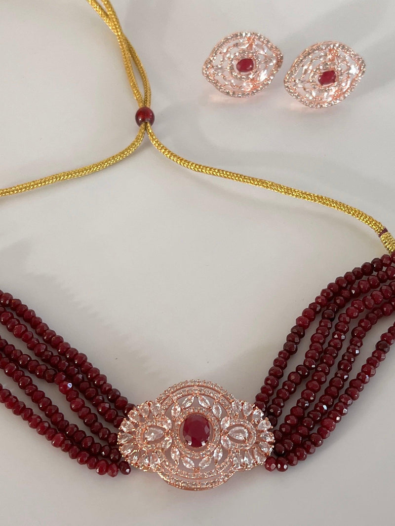 Bollywood Style Ruby Wine Color and Rose Gold Polish with CZ Necklace Earrings Choker Set in High Quality Beads and American Diamond - Kaash
