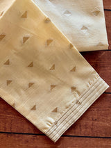 Cream men's kurta pajama in raw silk with hand embroidery & mirror work on neckline — Kaash Collection