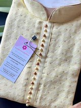 Yellow men's kurta pajama in soft silk with small zari buttis on soft silk — Kaash Collection